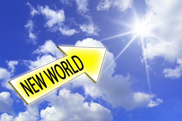 太陽に向かって「NEW WOLD」と書いた矢印